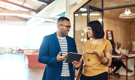 Two business people talking
